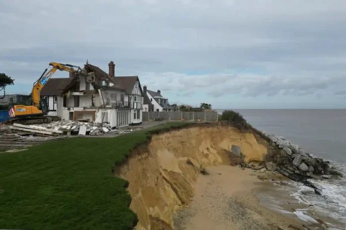 Demolition Begins on Suffolk Cliffside Home Threatened by Coastal Erosion